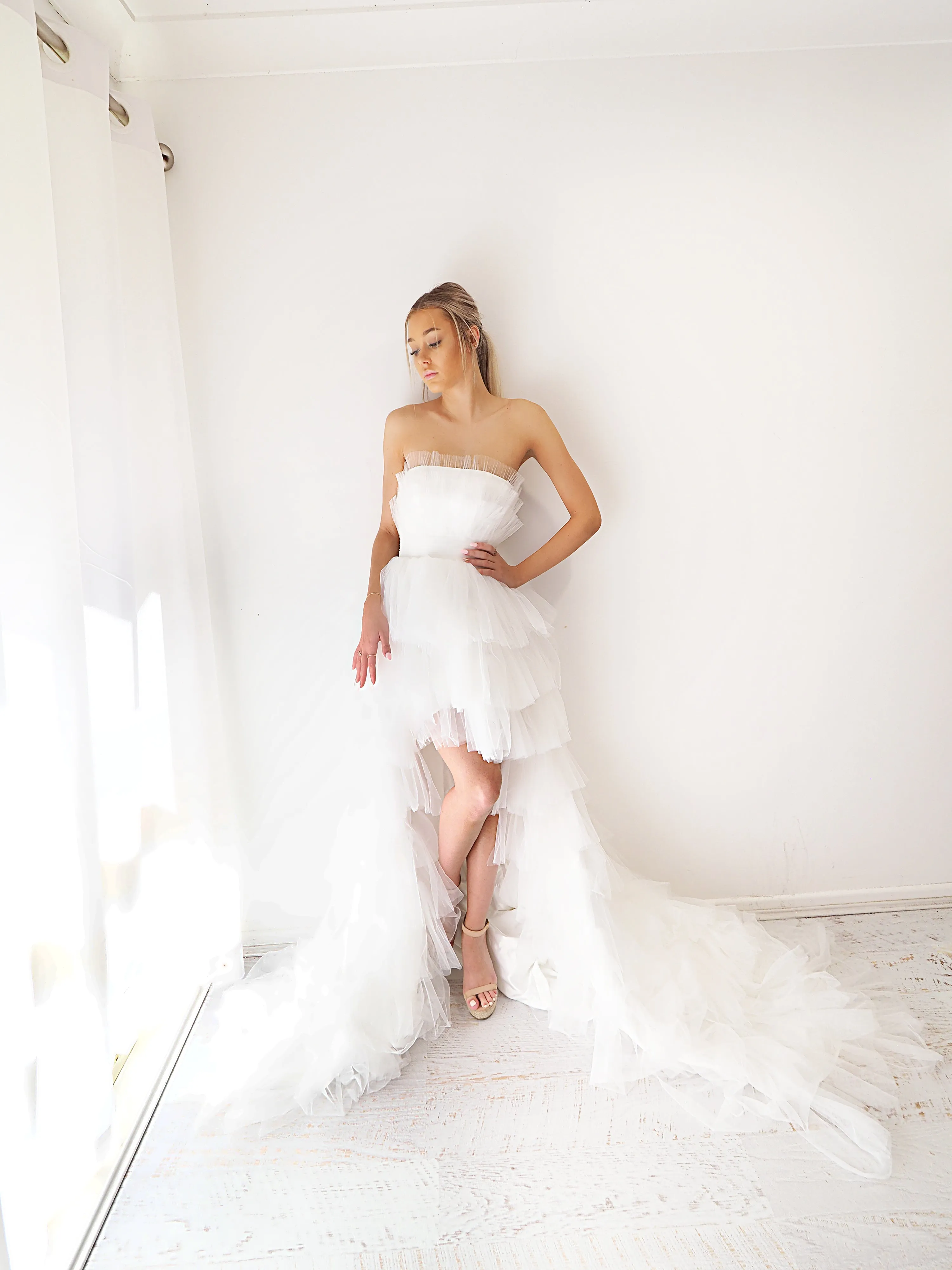 White pleated layered high and low tulle dress for hire
