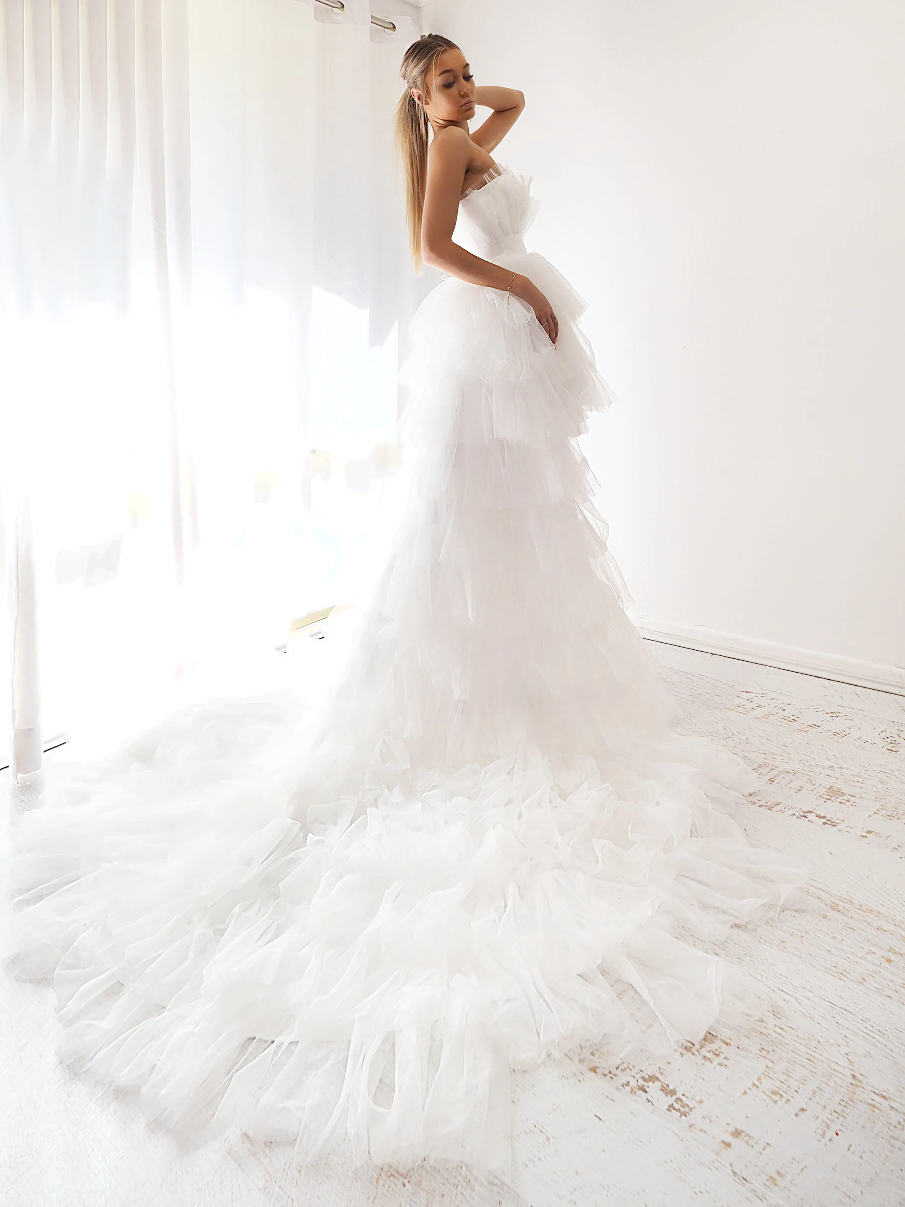 White pleated layered high and low tulle dress for hire